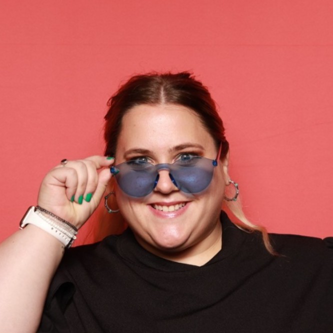 Noel Diem, Senior Marketing and HRC Content Manager at Mitratech seen with blue color sunglasses